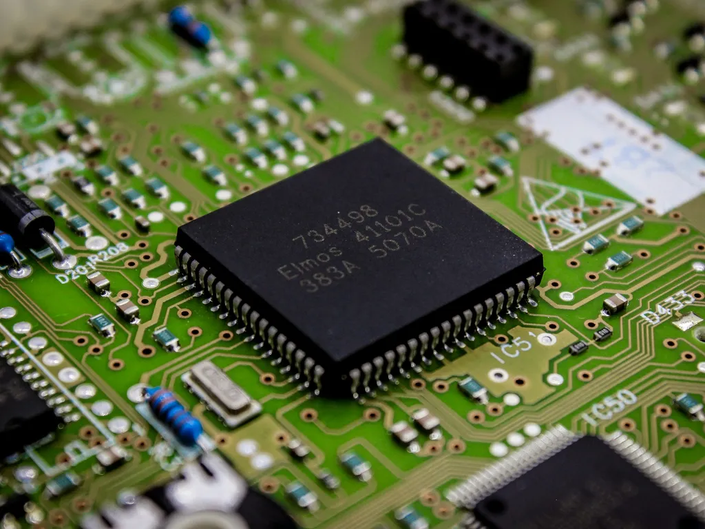 Electronic components and microchip detail illustrating the component supply category.
